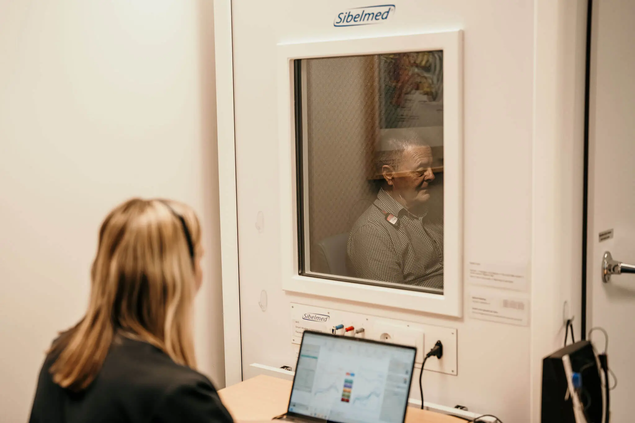 Bishopdale Hearing performing a hearing test