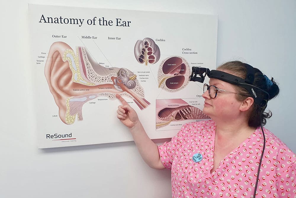 Emma showing the anatomy of the ear for ear wax removal in Christchurch