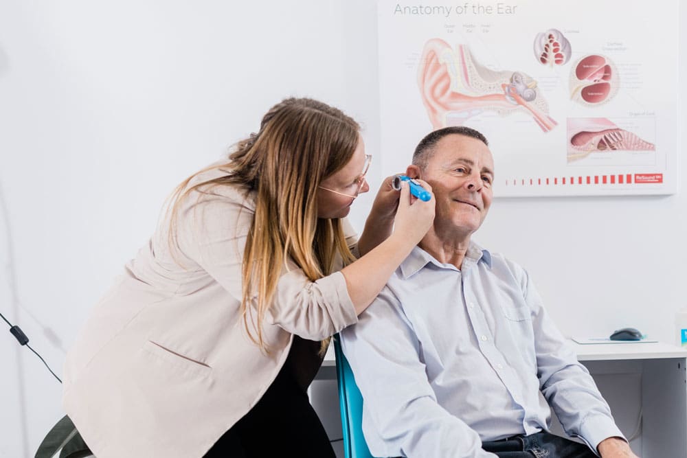 Bradi checking hearing and ear health at her audiology clinic in Christchurch